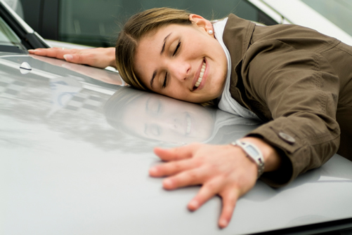 Women Hugging Car